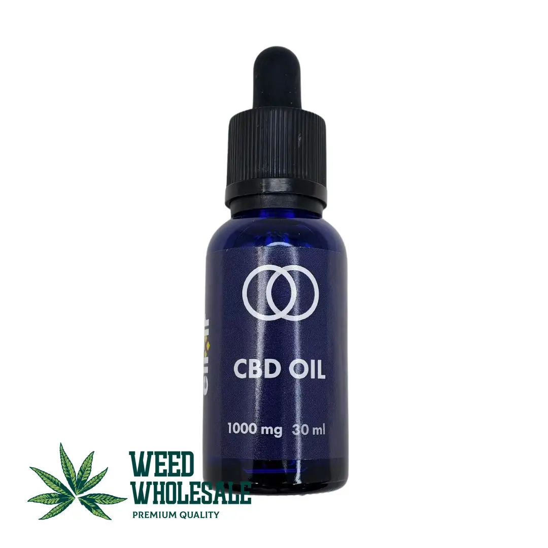 A 30ml bottle of Elixir CBD oil with a golden hemp extract and graduated glass dropper.