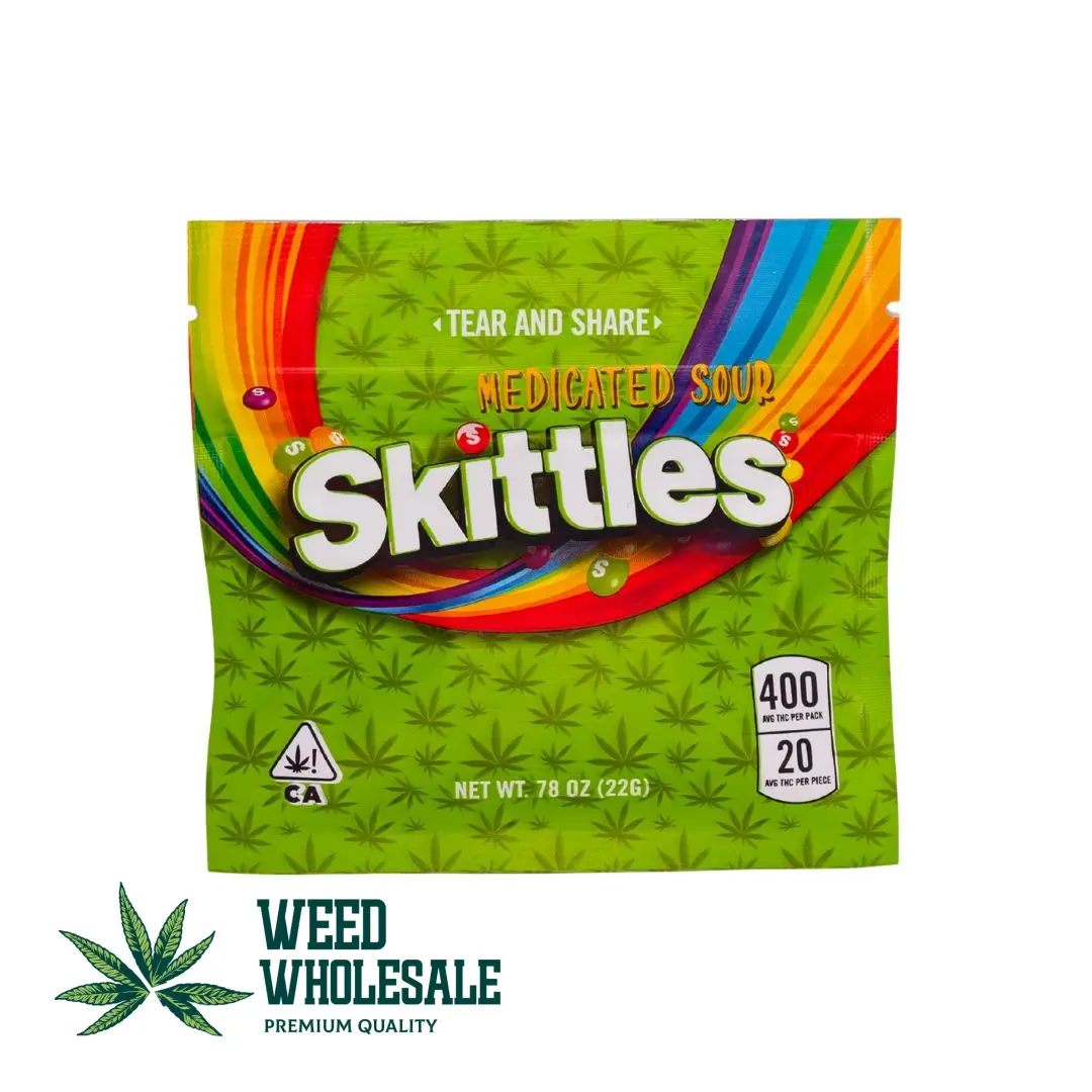 A green pack of Skittles Medicated Sour 400mg Gummies